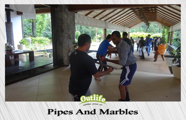 Pipes and Marbles team building activity